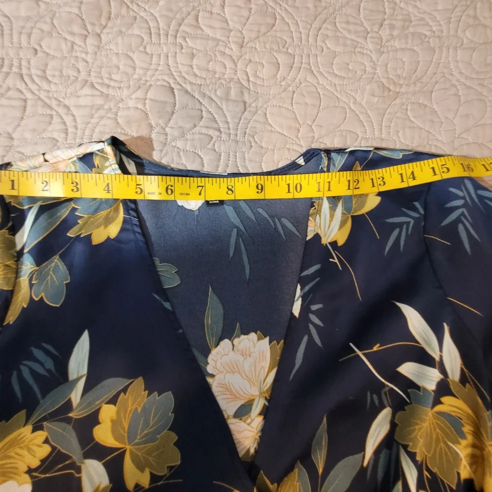 Lulus navy floral wrap dress with tie waist and long sleeves. Size Medium - Picture 9 of 12